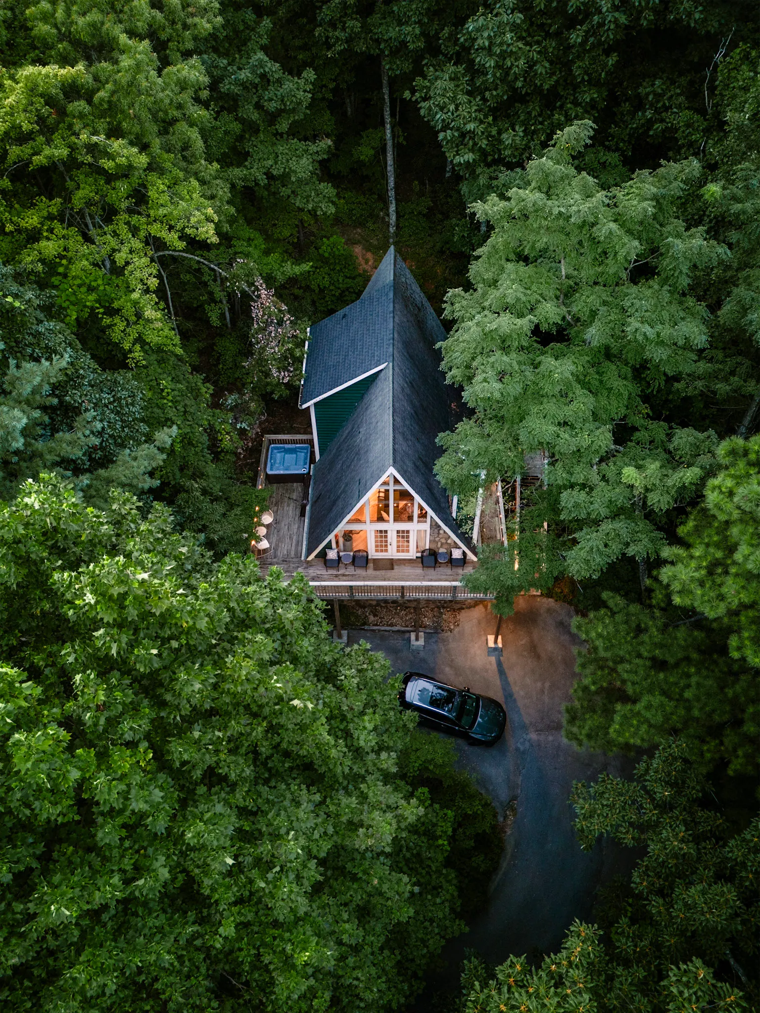 Aerial of cabin nestled in the woods at Little Green Cabin