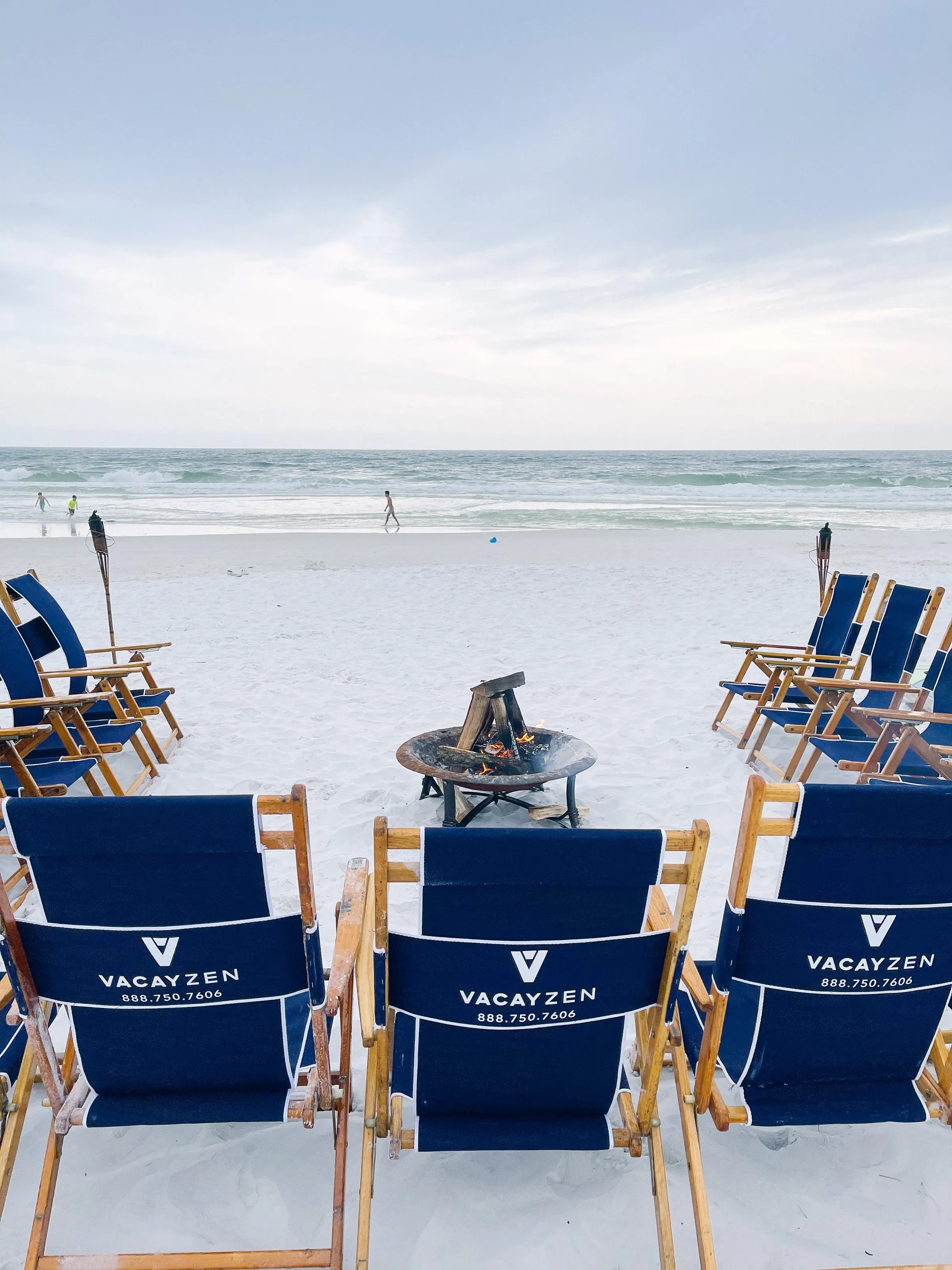 Beach loungers on the sand at Sand Reef Cottage