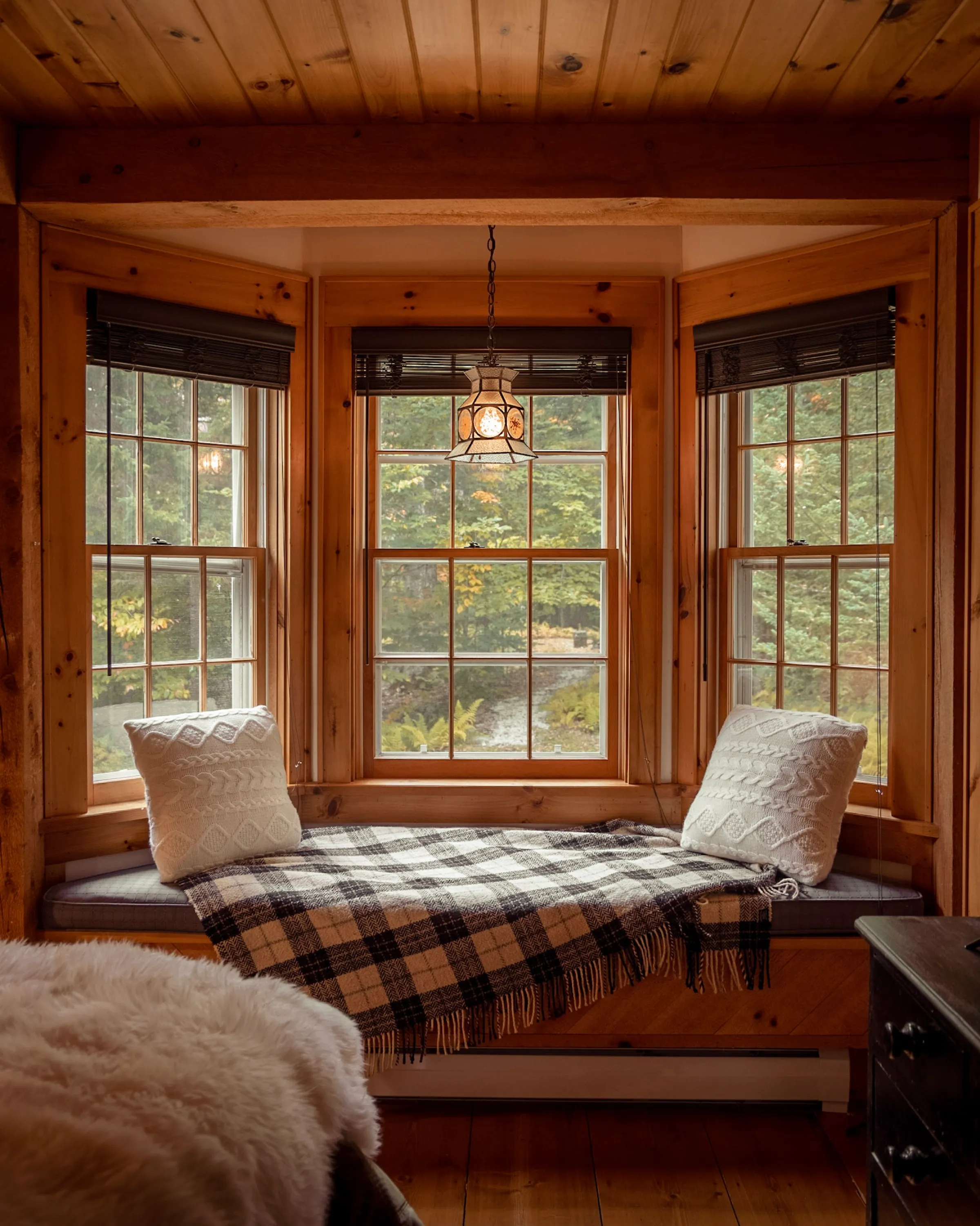 Bedroom with fireplace at Deerwood Hill