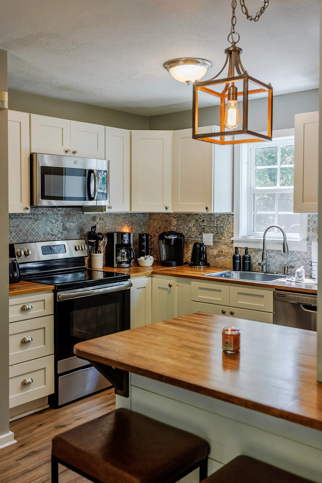 Kitchen in warm evening light at Hygge Blue Chalet