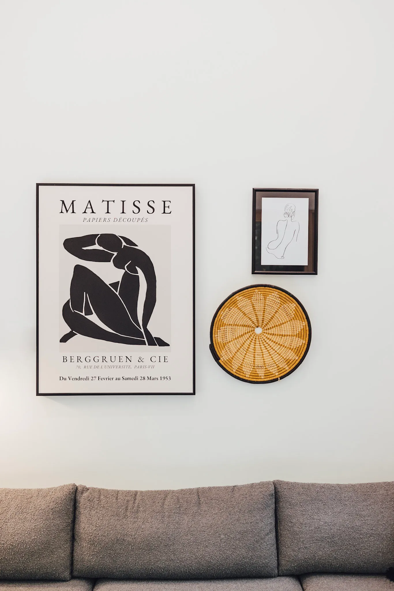 Matisse gallery wall detail above the sofa at Nordic Haus