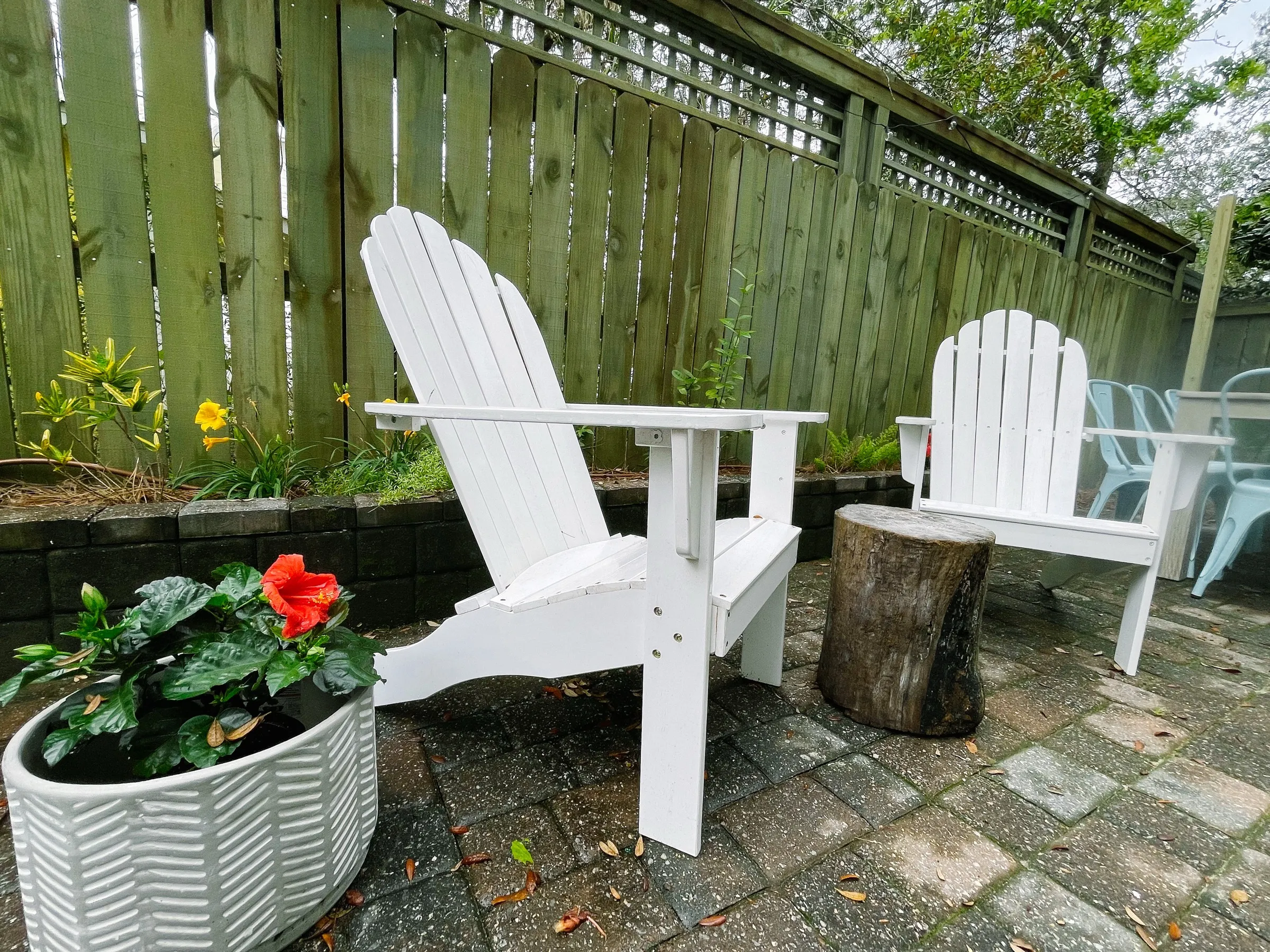 Adirondack chairs on the patio at Sand Reef Cottage