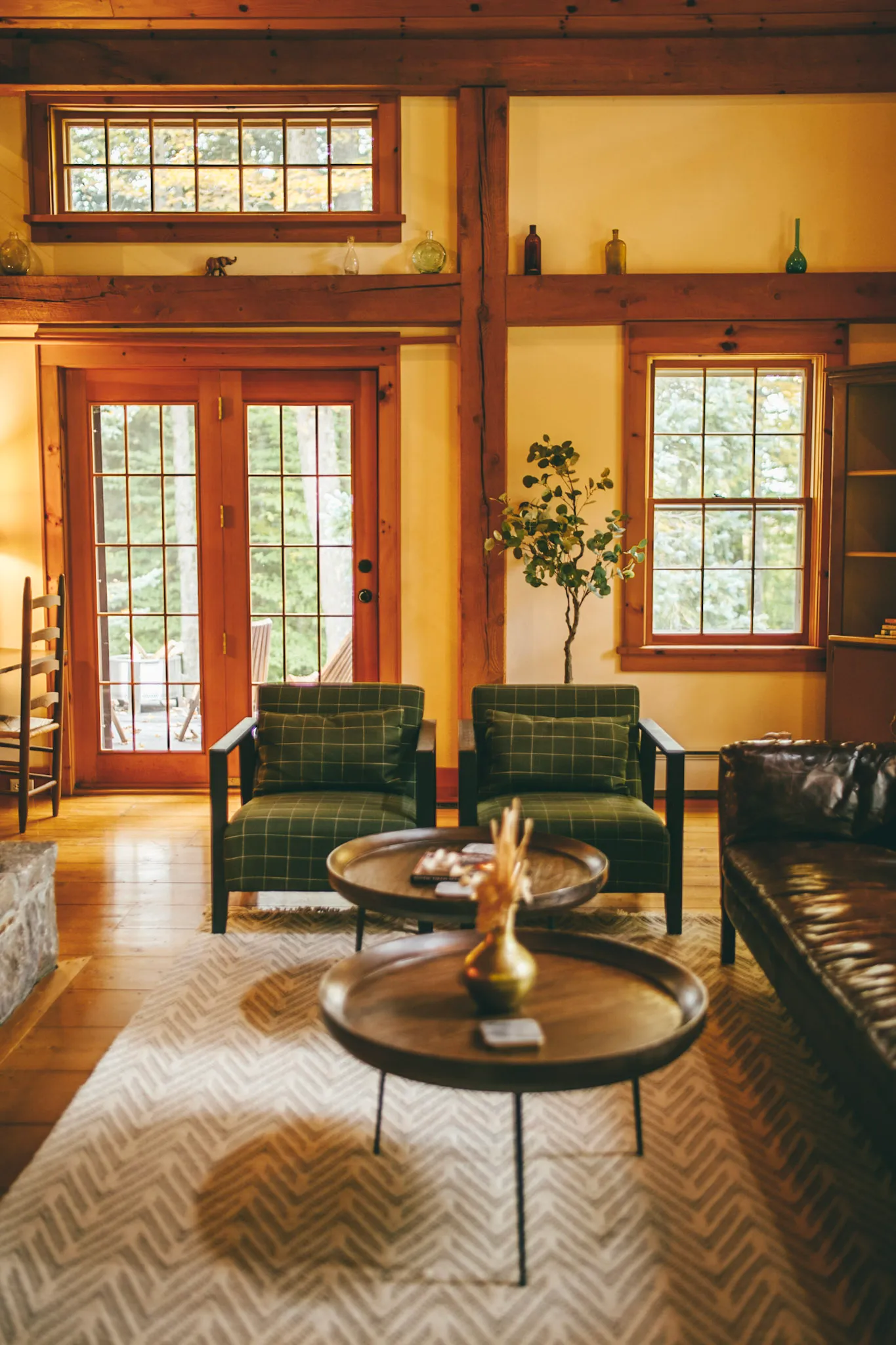 Great room wide with french doors and potted tree at Deerwood Hill