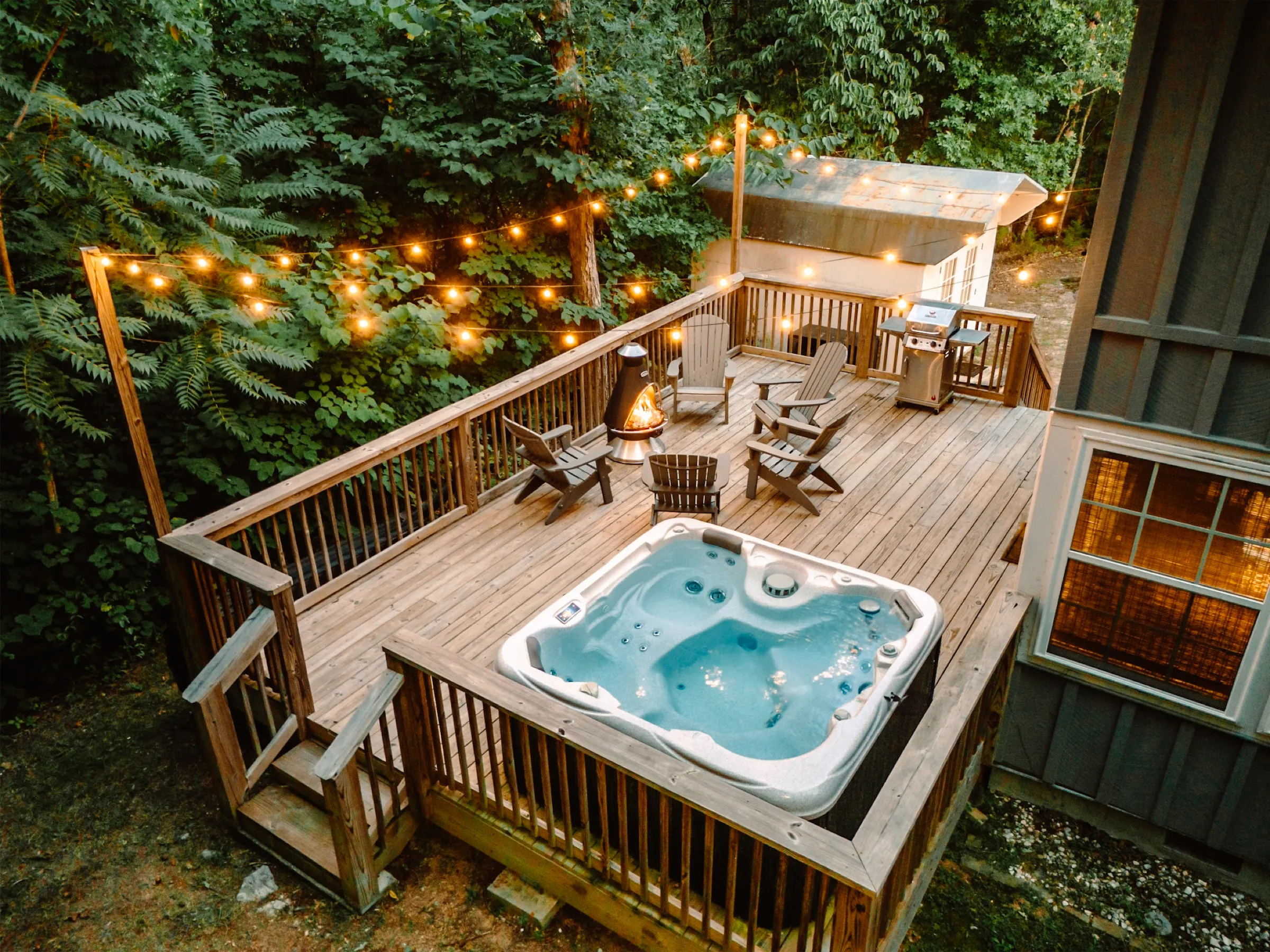 Hot tub at night at Hygge Blue Chalet
