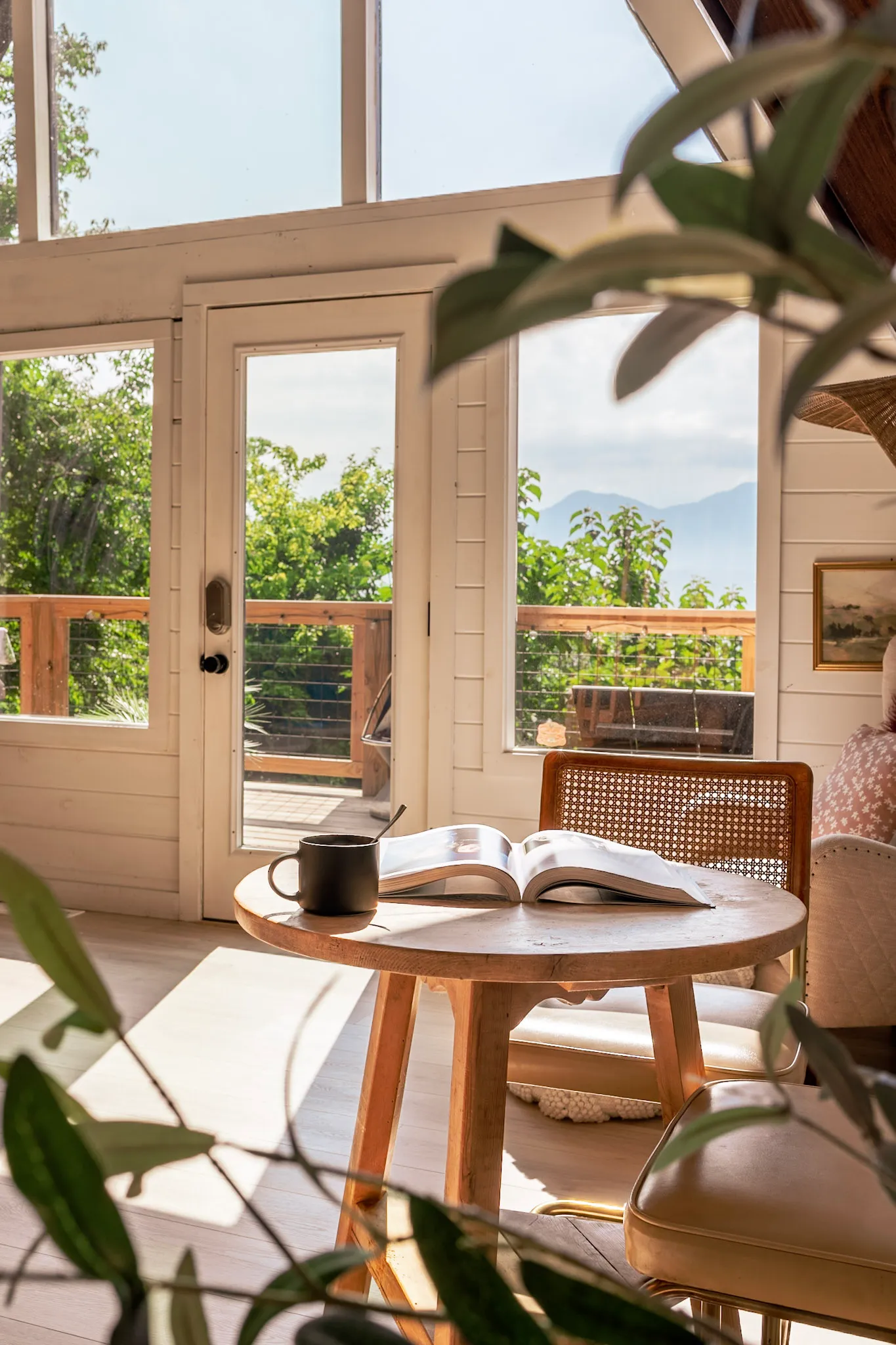Reading nook with coffee and a view of the deck at Après Chalet