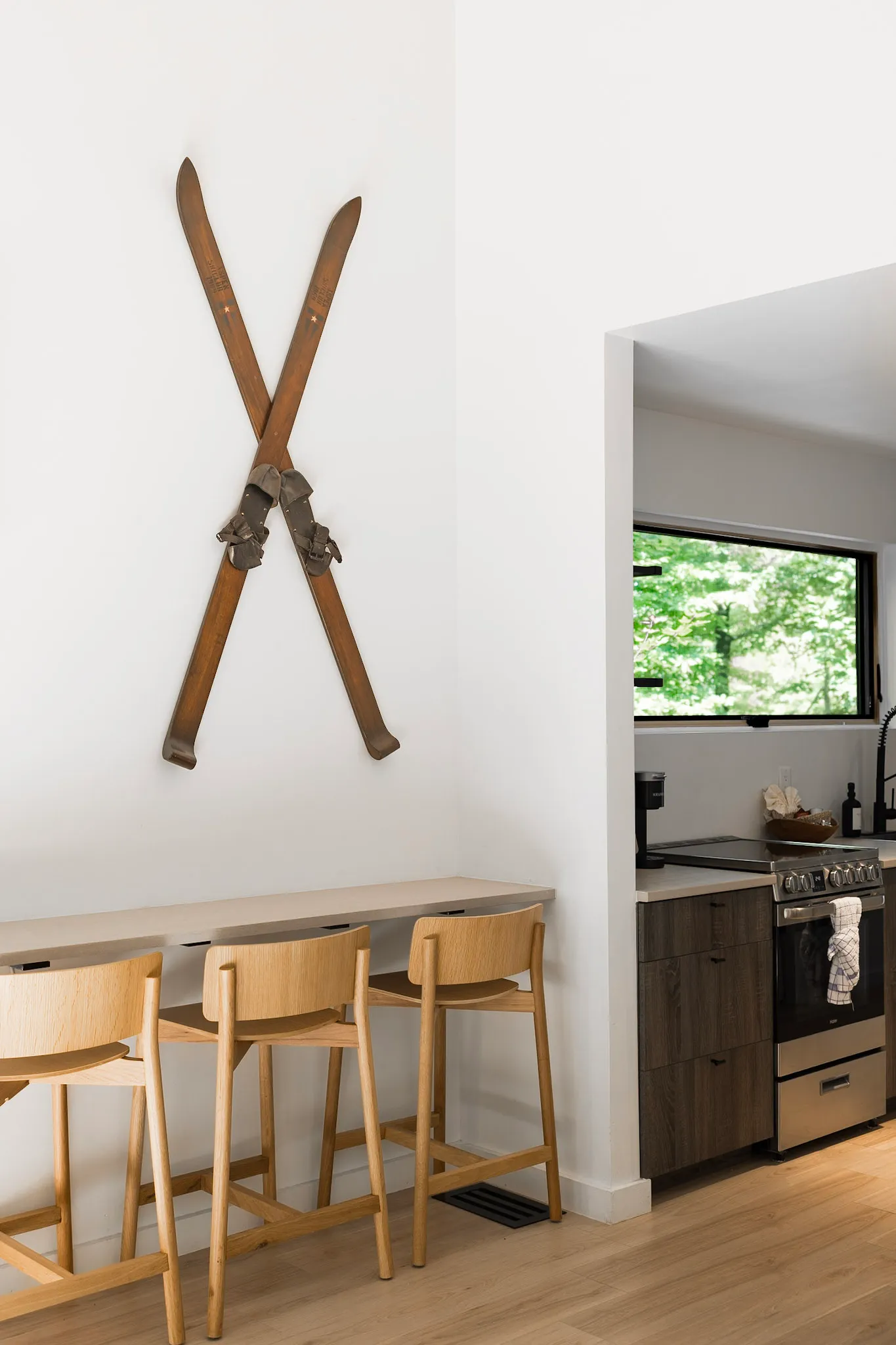 Dining bar with stools open to the kitchen at Nordic Haus