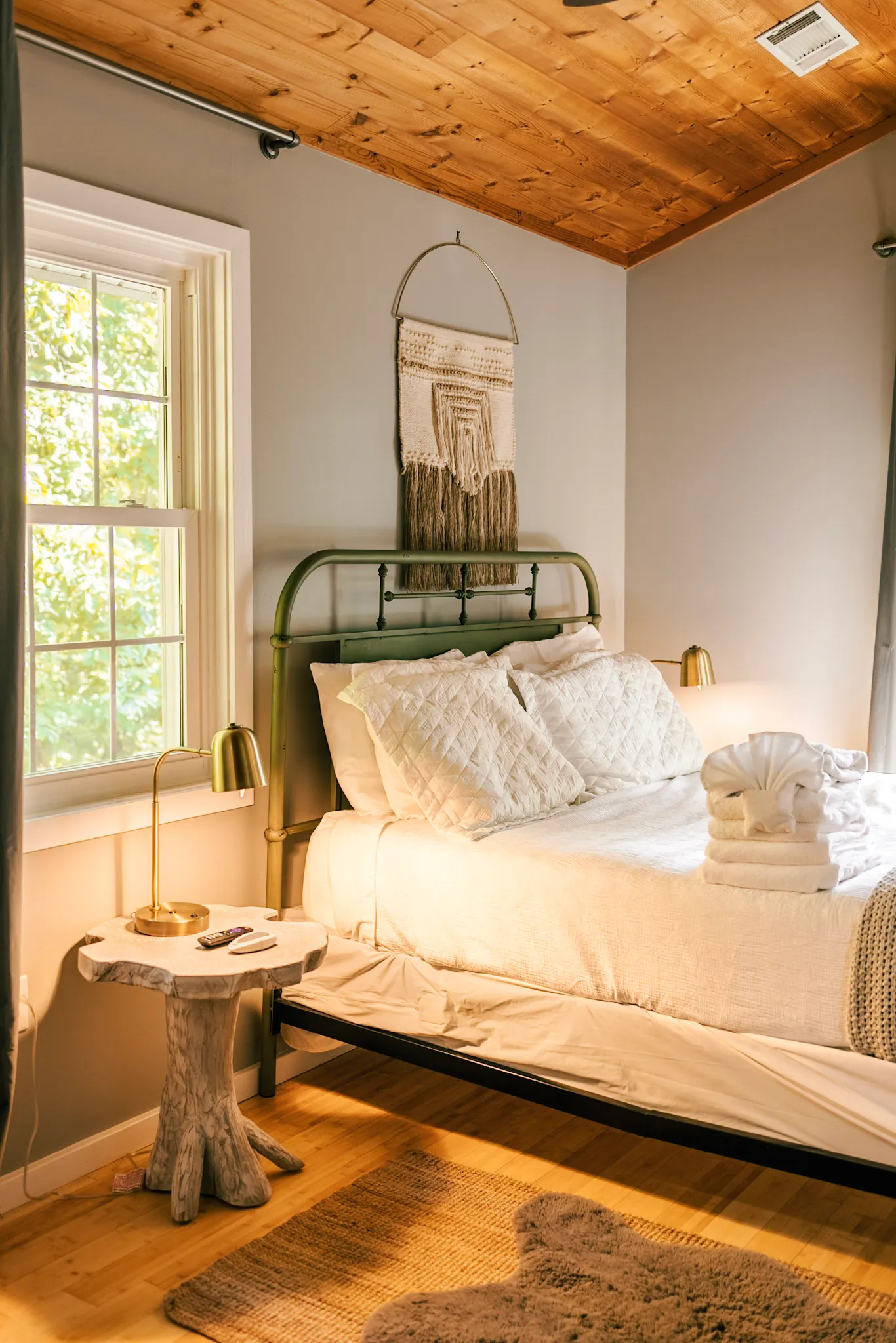 Bedroom two alternate angle with rustic side table at Hygge Blue Chalet