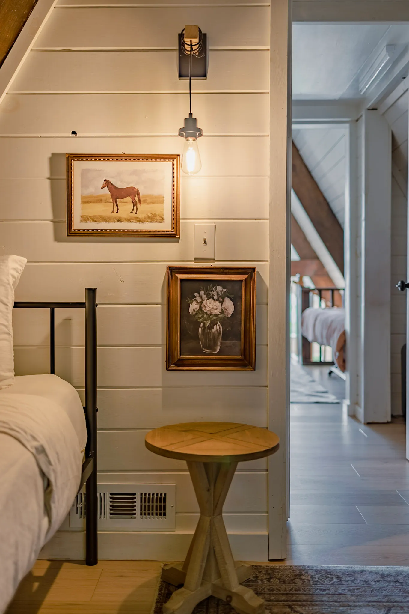 Bedroom one nightstand and wall art detail at Après Chalet