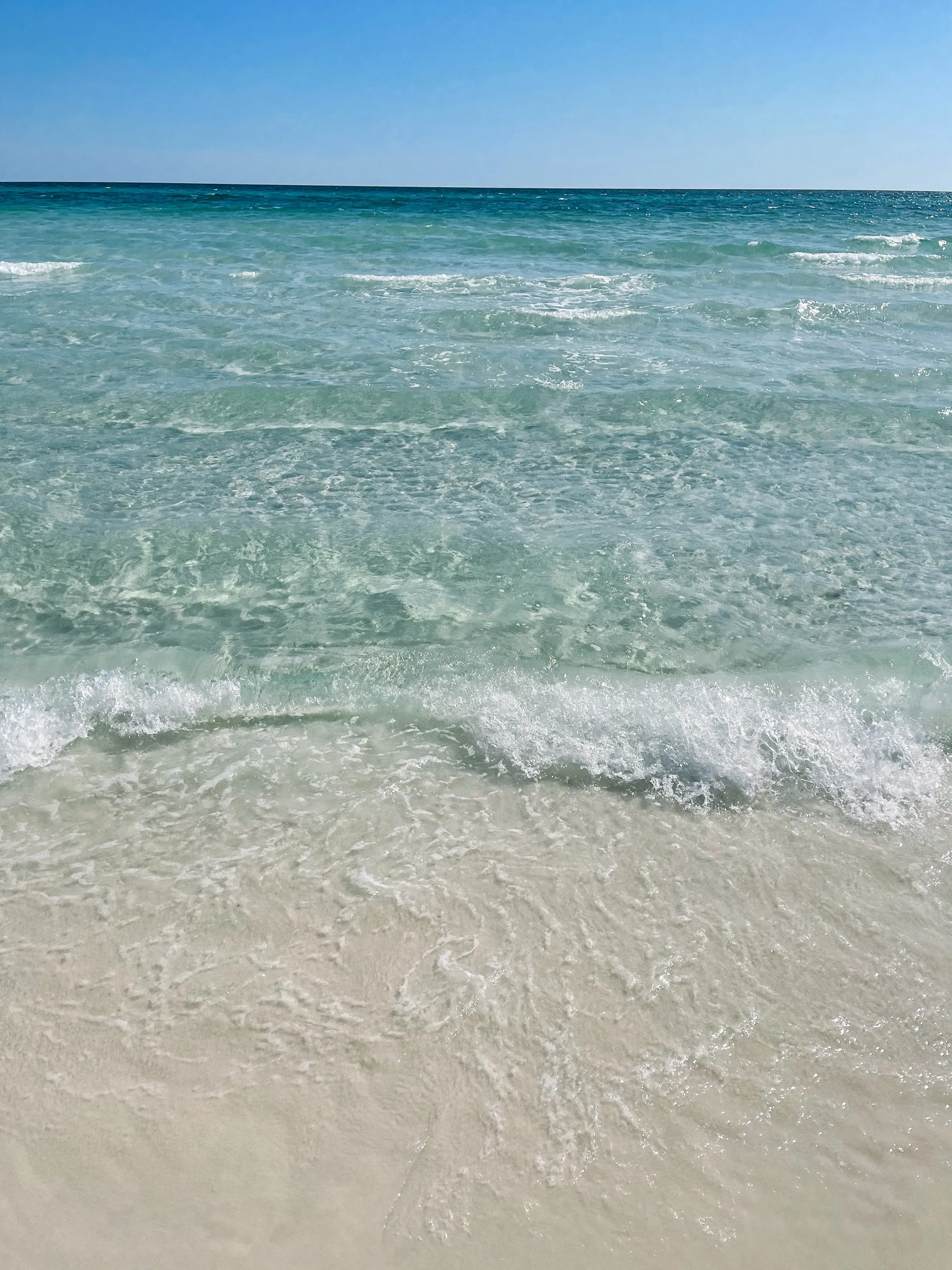 Emerald Gulf water at Sand Reef Cottage