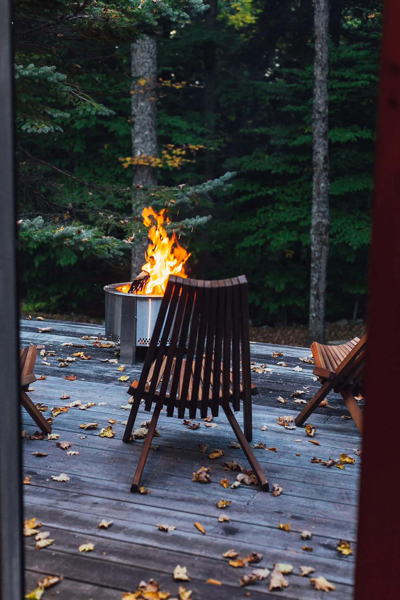 Deck fire pit close up with flames at Deerwood Hill